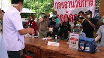 Thailand's health minister visits COVID-19 checkpoint, hospital