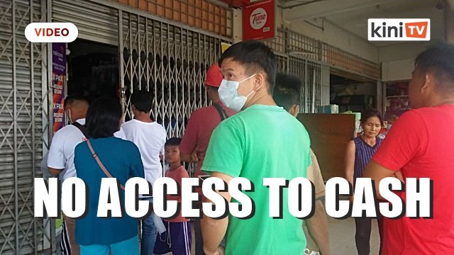 With no nearby ATM, Sungai Asap folks can't access cash aid