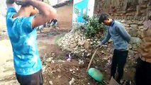 Youth doing regular cleaning in Bhudsha village