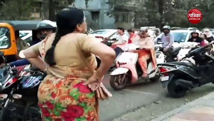 Pune Woman stopping bikers from riding on footpath