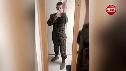 Marine commander sharing video turning his hand over without moving his wrist