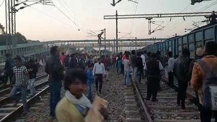 A young man made a ruckus by climbing in a moving goods train