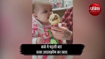 little baby one gets her first taste of ice cream gives unique reaction