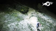 Red Bull racer takes on drone downhill in the dead of night