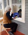 Elderly Man Adorably Reads to Granddaughter Through Window Amid Coronavirus Lockdown