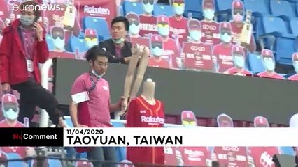 Robot drummers and posters take to the stands for Taiwan's baseball season