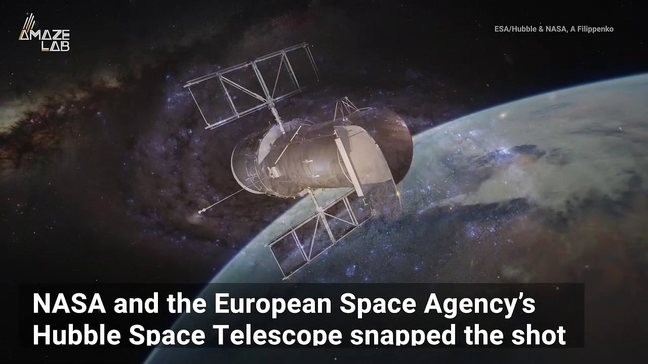 Hubble Captures Swirling Galaxy Sprinkled With Massive Blue Stars