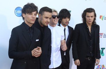 One Direction members re-follow Zayn Malik on Twitter