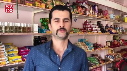 Kimliğini gizleyen şahıs bakkalın borç defterini satın aldı