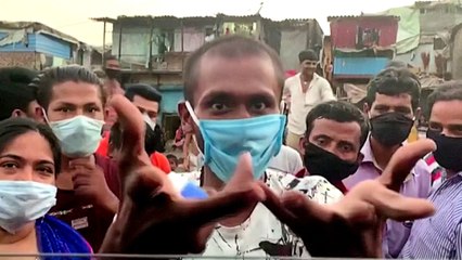 India's migrant workers protest lockdown extension to curb virus