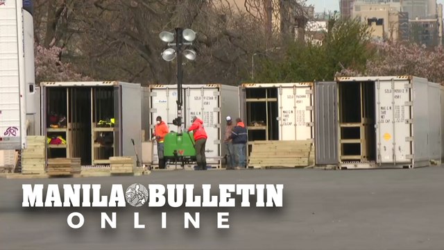 Refrigerated trailers and shipping containers are turned into temporary morgues in NYC