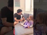 Man Sings on Fake Mic and Encourages Little Daughter to Sing Along During Quarantine