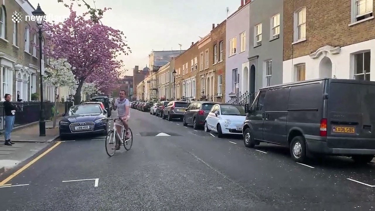 Bingo party on lockdown London street with bingo caller on bike