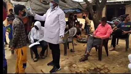 इटावाः थर्मल स्क्रीनिंग द्वारा किया गया ग्रामीणों का चेकअप