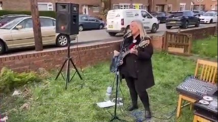 Elaine Rennie sings for her neighbours