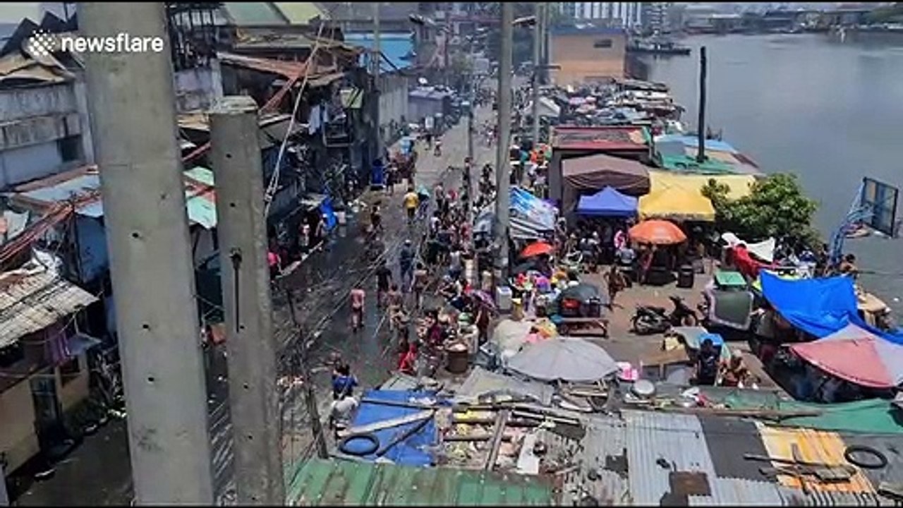 Fire guts residential area amid COVID-19 lockdown in the Philippines