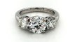 Three Stone Diamond Engagement Ring in Platinum with A GIA Certified 1.70ct. H Color SI1 Clarity Round Center