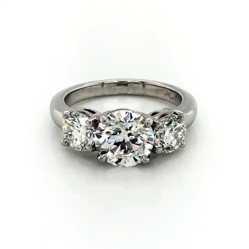 Three Stone Diamond Engagement Ring in Platinum with A GIA Certified 1.70ct. H Color SI1 Clarity Round Center