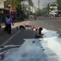 Lockdown_ A Man Was Seen Sharing Milk Split On A Road With Dogs