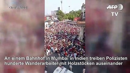 Polizei treibt Wanderarbeiter in Indien mit Holzstöcken auseinander