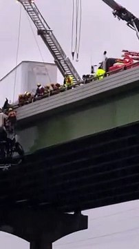 Driver Rescued From Truck Dangling off Bridge