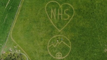 Field has massive tribute to health service mowed in it