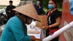 'Rice ATMs' in Vietnam Are Dispensing Food for People Without Work Amid Coronavirus Pandemic
