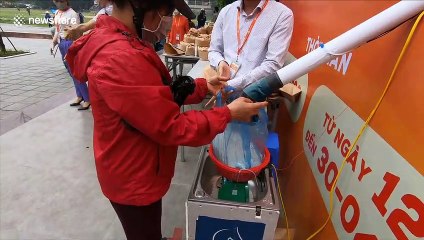 'Rice ATMs' provides free food for unemployed in Vietnam during COVID-19 pandemic