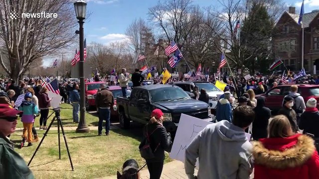 Despite strict social distancing measures to stop coronavirus outbreak, protestors in Minnesota closely gather to demand economy reopen