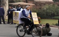 BJP MP Dr Vikas Mahatme reaches Parliament by riding cycle
