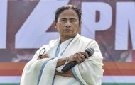 Watch: Mamata Banerjee paints TMC symbol on wall of BJP’s office