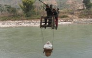 Haldwani: Students put lives at risk to cross river by cable trolley