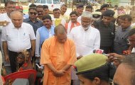 UP CM Yogi Adityanath meets victims’ family members in Sonbhadra