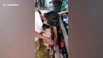 Toddler rescued after getting his finger stuck in car bumper