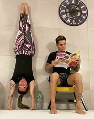 Philippe Coutinho practices balancing with wife