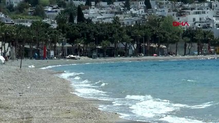 MUĞLA Yasağı çiğneyip denize giren genç kendisini savundu: Virüsü marketten kapıyorlar, deniz temiz