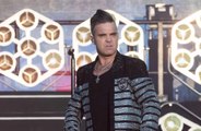 Robbie Williams promete conversas francas sobre drogas com filhos