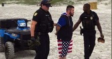 Police enforcing social distancing rules on Florida beach arrest fugitive Pennsylvania homicide su