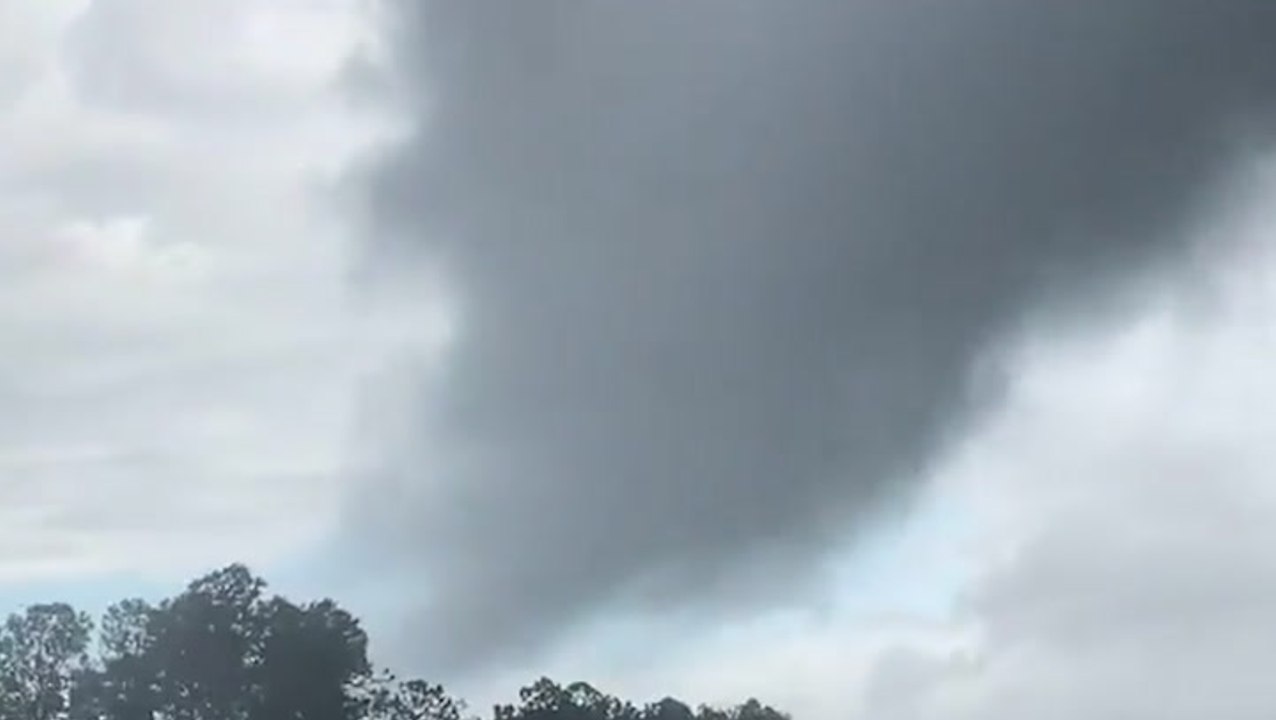 Tornado touches down in front of motorist
