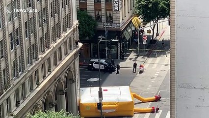 Man attempts to jump from downtown Los Angeles building as police intercede