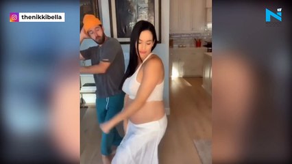 Former Wrestler Nikki Bella flaunts her baby bump in a savage challenge with fiance
