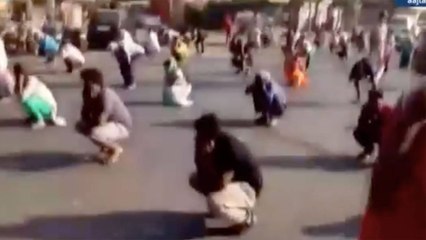 Women were made to do sit ups by police as punishment