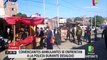 Comerciantes informales se enfrentan a la policía durante desalojo