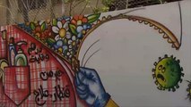 فلسطين.. جداريات فنية إرشادية للتوعية بمخاطر كورونا