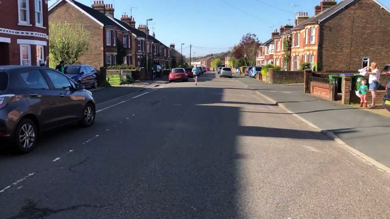 Neighbours cheer Jim Hardwick during his Horsham marathon