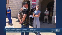 Phoenix ICU nurse faces protestors in rally over re-opening state amid coronavirus cris