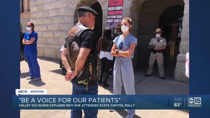 Phoenix ICU nurse faces protestors in rally over re-opening state amid coronavirus cris