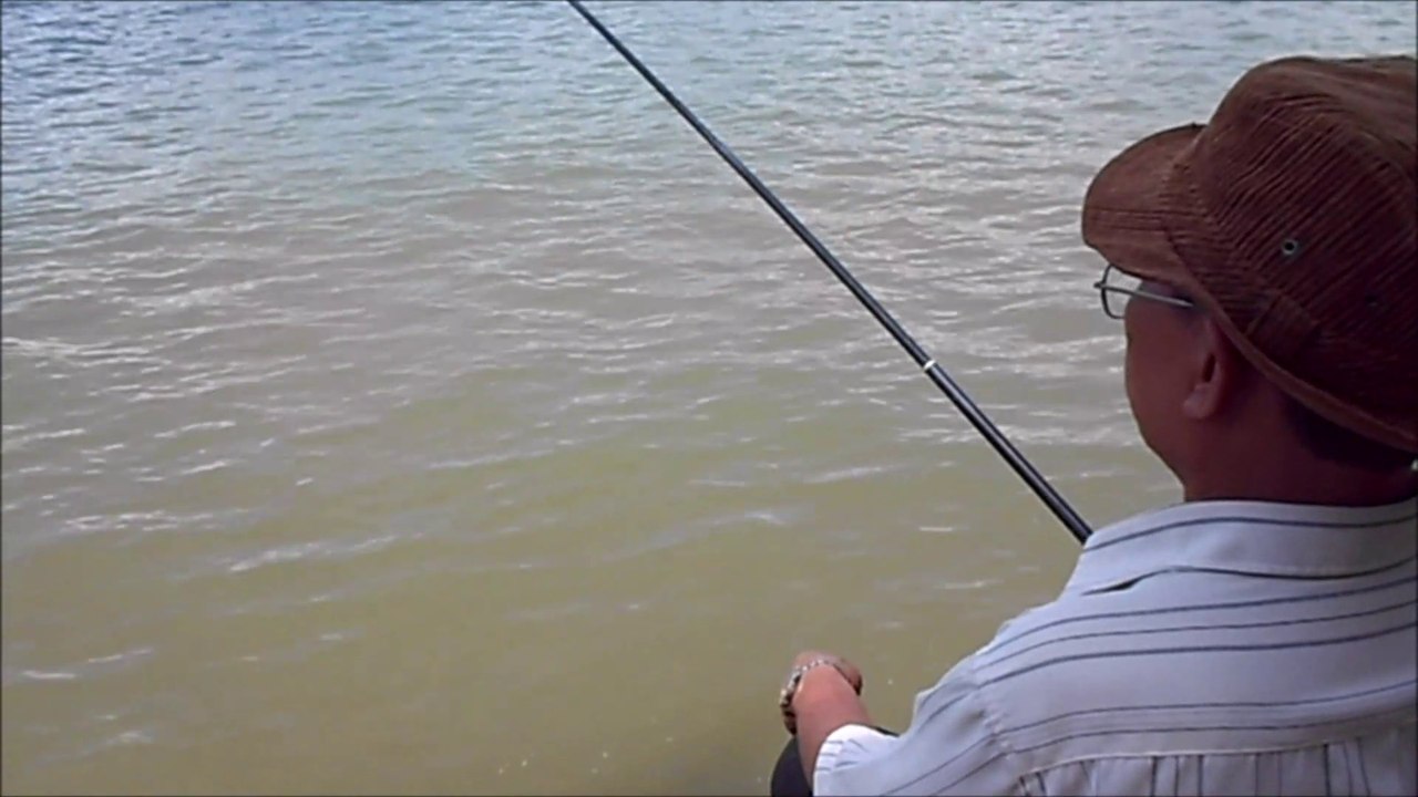Elderly old man entertaining fishing