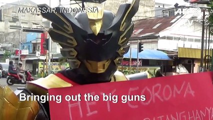 'Superheroes' on Indonesian streets raise awareness about coronavirus