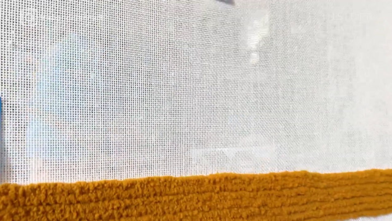 Artist uses rug-tufting gun to create hanging pieces